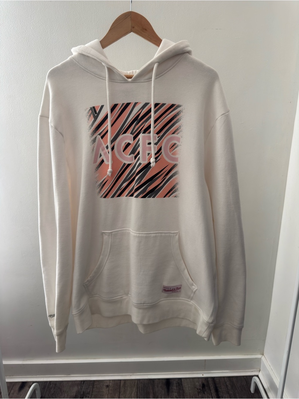 Mitchell & Ness Cream Pullover Hoodie with Pink & Black Graphic